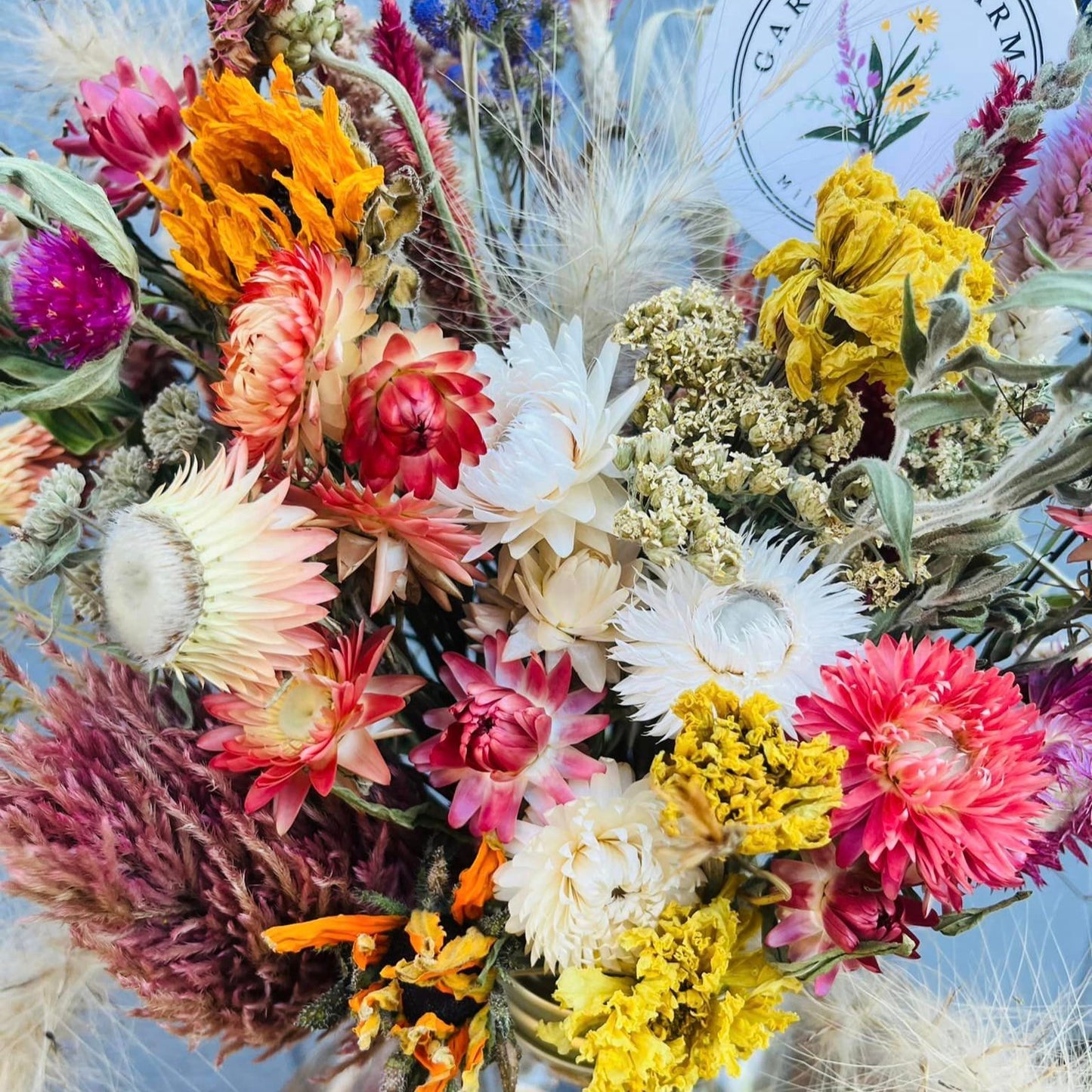 Closeup of dried floral arrangement in vibrant colors